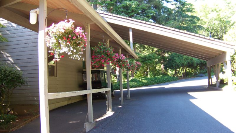 Hanging baskets of flowers outside Inn at Otter Crest