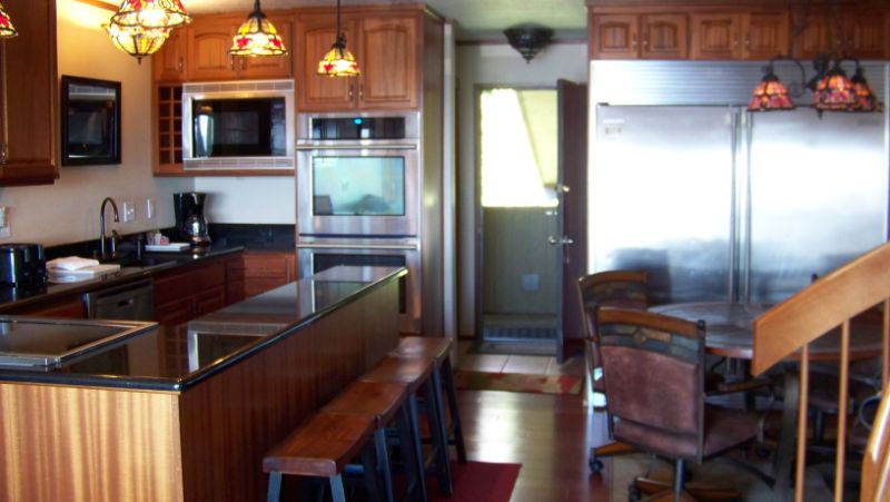 Inn suite with kitchen and dining table.